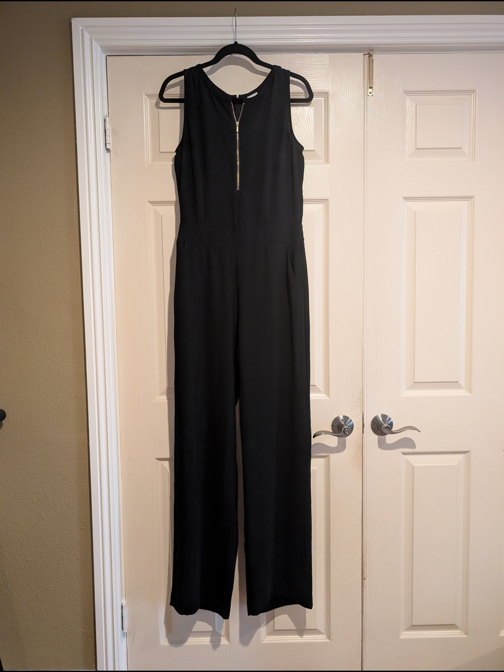 CAbi Black Sleeveless Wide-Leg Jumpsuit with Front Zip Accent